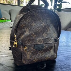 Louis Vuitton Brown Monogram Backpack with Gold Accents